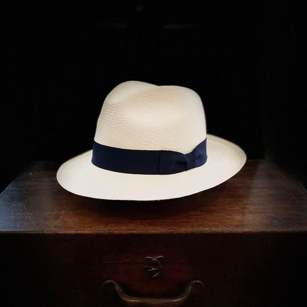 White straw cuenca weave classic panama hat midnight blue band