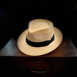 Natural straw, open weave golf style finely woven classic panama hat with black grosgrain bow band
